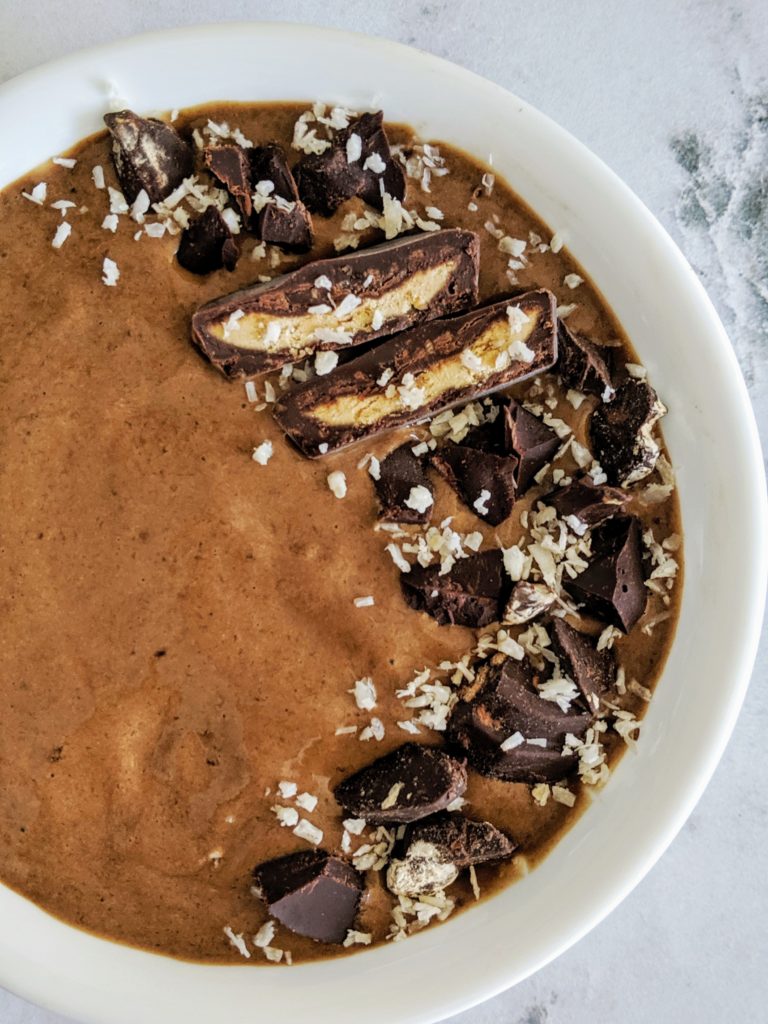This Chocolate Peanut Butter Protein Smoothie Bowl tastes like a creamy Reese's Peanut Butter Cup! A perfect protein-packed breakfast or post-workout fuel. Sweet, delicious,  and made with just 5 ingredients.