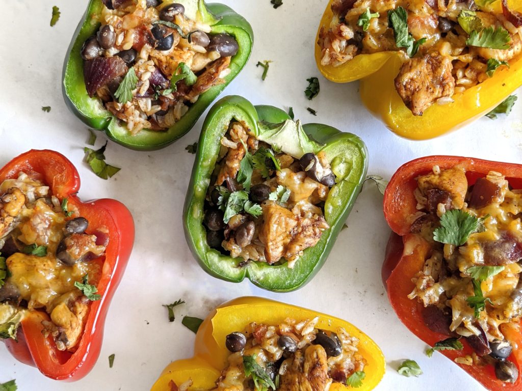 Healthy and easy stuffed bell peppers made with fajita seasoned chicken breast, brown rice and black beans with no beef, no ground beef and no meat.