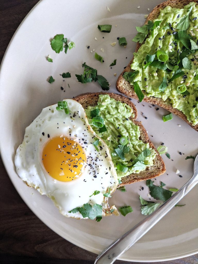 The only thing better than avo toast is this Everything Fried Egg Avocado Toast! Top a slice of toasted bread with mashed avocado, a perfectly fried egg and everything bagel seasoning for a special Sunday brunch or even Toast Tuesday!