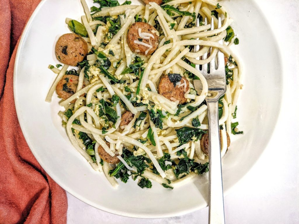 Low-Carb Palmini Carbonara with Kale and Sausage is a Keto-follower, Pasta-lover’s dream come true. Hearts of Palm noodles, butter-garlic kale and spicy jalapeño chicken sausages are tossed in a cheesy-egg mix to create this glorious concoction.