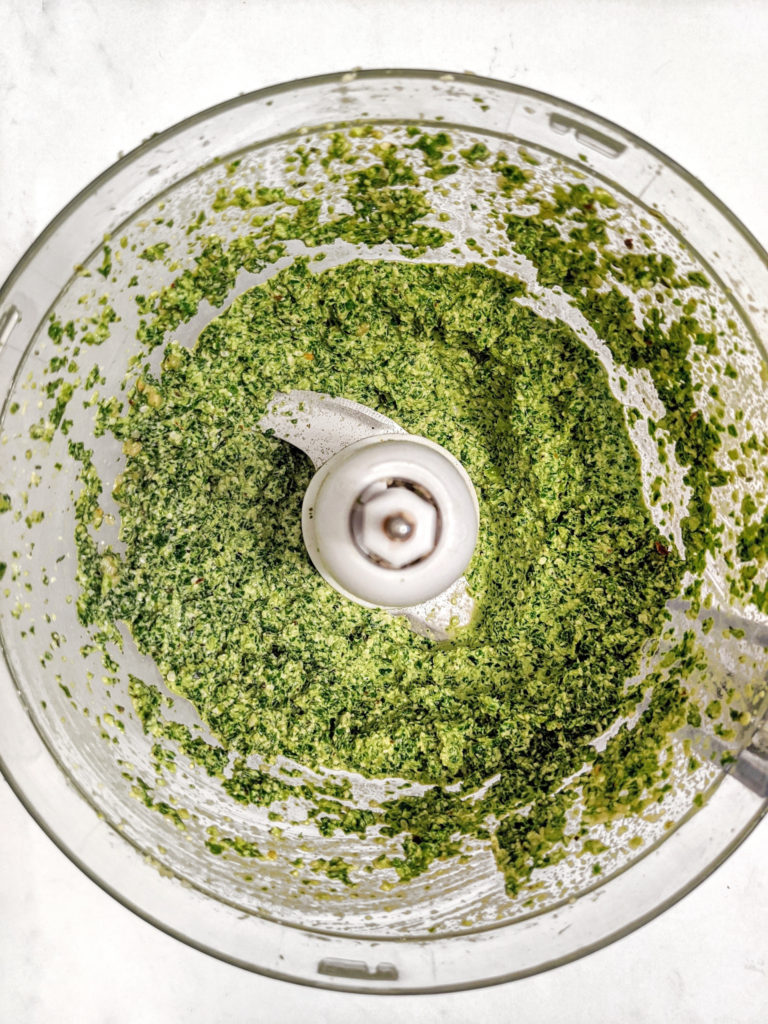 Learn how to make pesto at home with this easy recipe that uses kale and hemp for a pesto without any nuts!