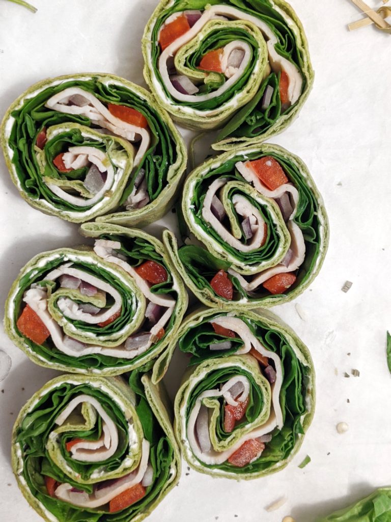 Use this recipe to learn how to make the best homemade turkey wraps with deli meat, spinach and cream cheese for the perfect easy lunch. Turkey spinach roll ups with cream cheese and tortilla or lavash flatbread are an easy and healthy recipe if you’re looking for wrap ideas with deli meat!