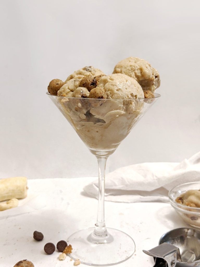 This Chocolate Chip Cookie Dough Banana Nice Cream is made with frozen bananas and filled with chunks of edible cashew flour cookie dough.