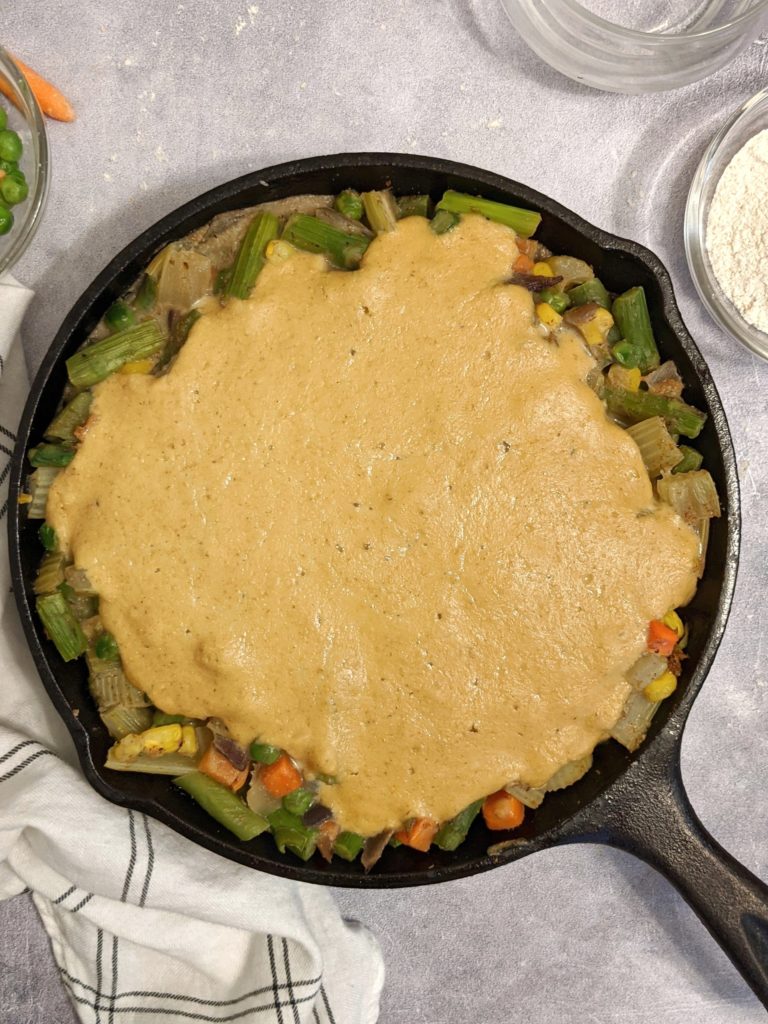 This healthy vegetable pot pie is loaded with asparagus and other fresh and frozen vegetables, and has no meat, no dairy, no chicken and no mushrooms, and no crust either - a healthy bisquick pancake topping crust instead!