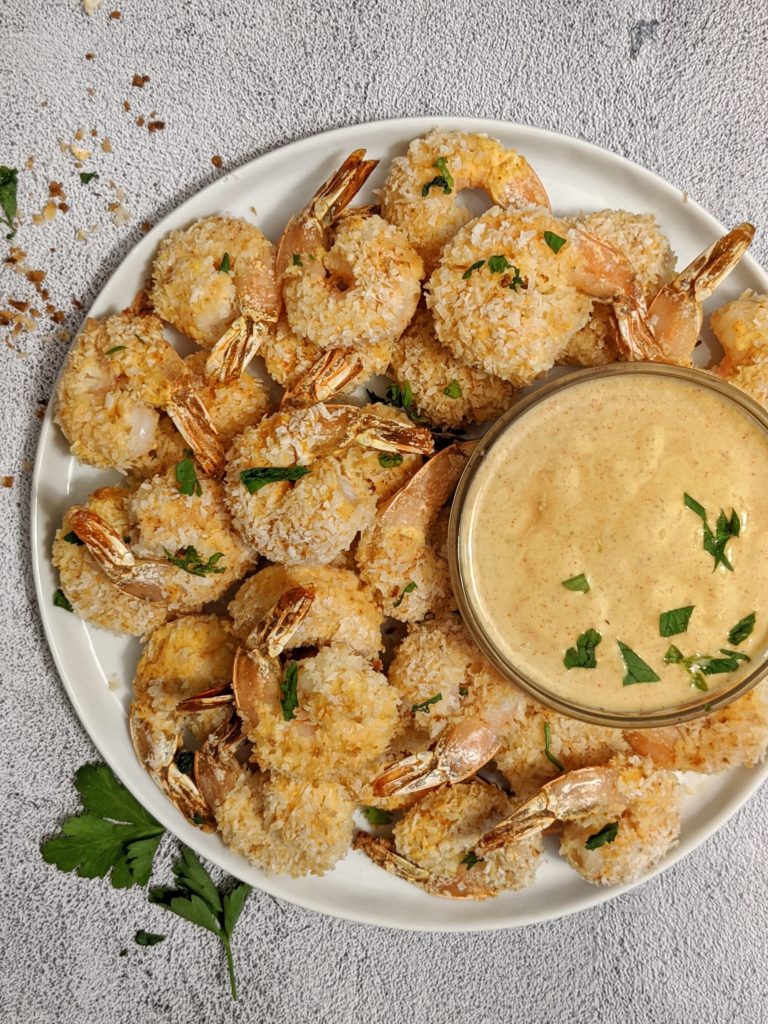 Hot and Spicy Baked Coconut Shrimp paired with a sweet Maple-Mustard Dipping Sauce. A Paleo and Keto friendly appetizer that’s just as crispy and crunchy as the deep fried version, but actually healthy!