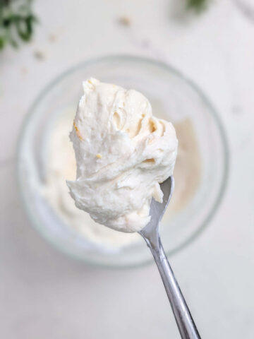 A thick, sweet, and creamy Protein Cream Cheese Frosting that's actually healthy! This protein powder cream cheese frosting is sugar-free and perfect for spreading, piping, or topping your favorite bakes. It holds shape beautifully-the possibilities are endless!