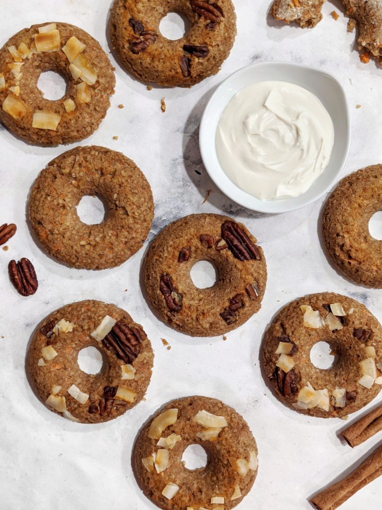 Perfectly sweet and spiced, these Carrot Cake Oatmeal Baked Donuts are a delicious - and gluten free - dessert for breakfast! Made with oat flour, protein powder and egg whites, they’re healthy too!