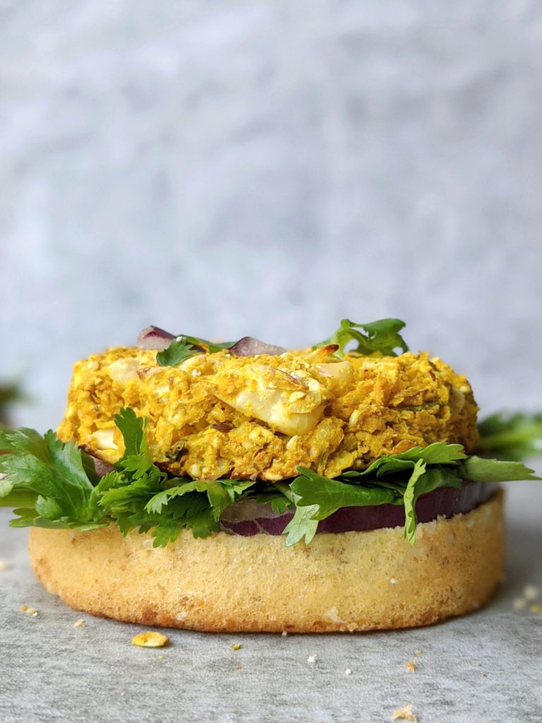 Easy to assemble and delicious, these Curry Spiced Cauliflower Chickpea Burgers are loaded with nutrition and packed with flavor! A perfect Vegan and Gluten-free meal for a night in or meal prep lunch.