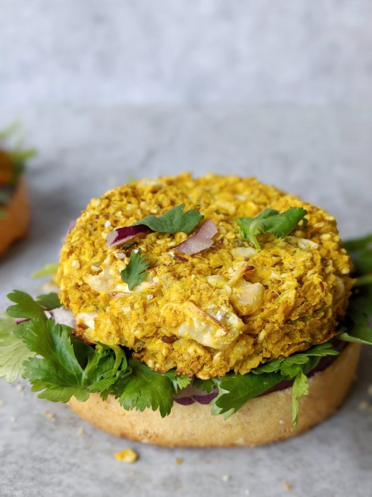 A healthy homemade veggie burger made with chickpea, cauliflower rice, curry powder and quick oats with all the spicy indian flavor.