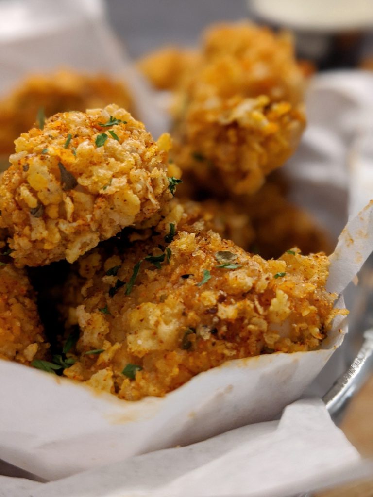 Meal prep these freezer-friendly cajun seasoned popcorn chicken nuggets made without breadcrumbs, flour, buttermilk, and freeze them with the “breading” or after they’re baked.