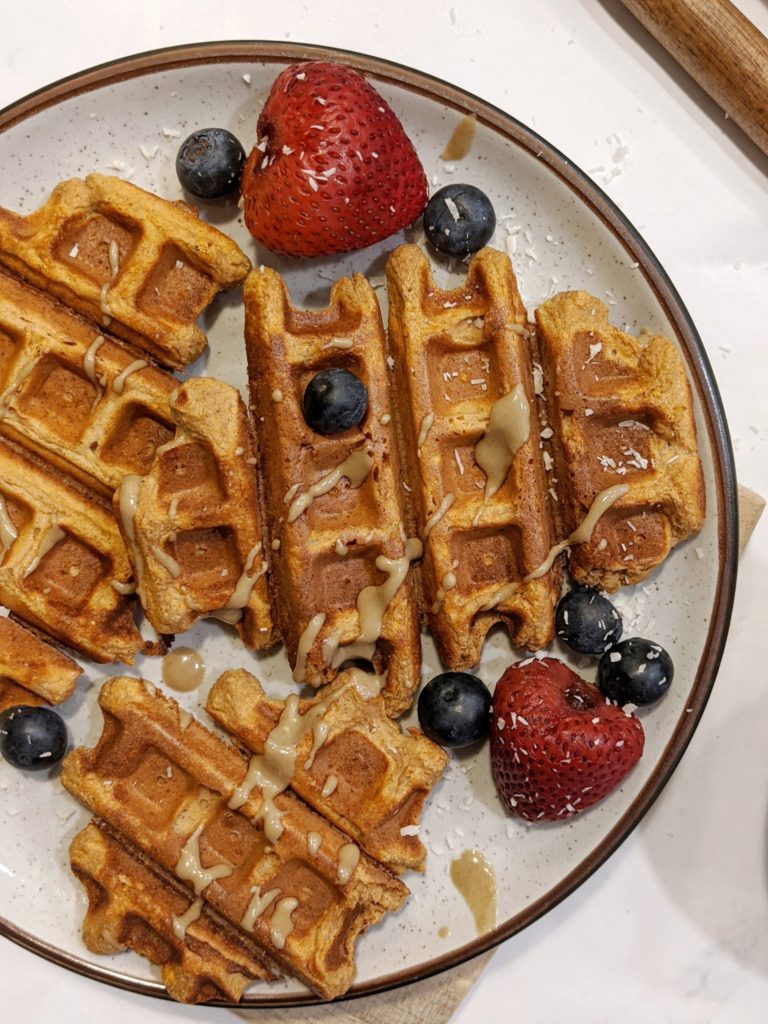 Make these easy homemade sweet potato protein waffles with quest protein powder for a sugar-free recipe that’s high in protein with no added sugar!