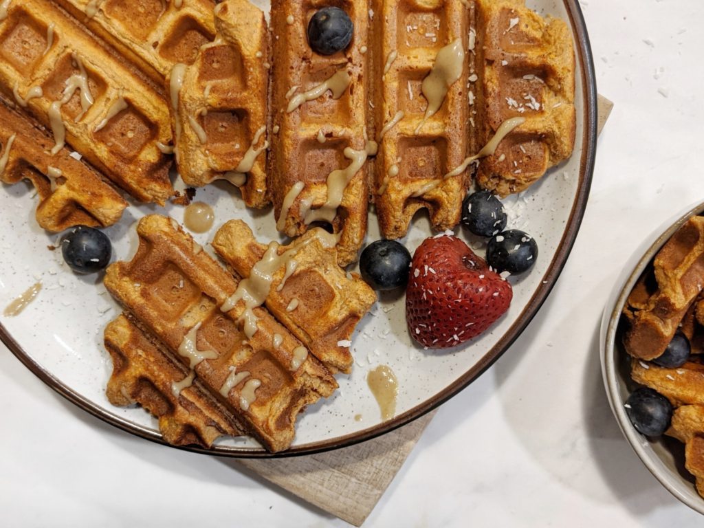 Easy and healthy, these sweet potato protein waffles are made with whole wheat flour and protein powder, and make a great brunch or freezer-friendly breakfast.