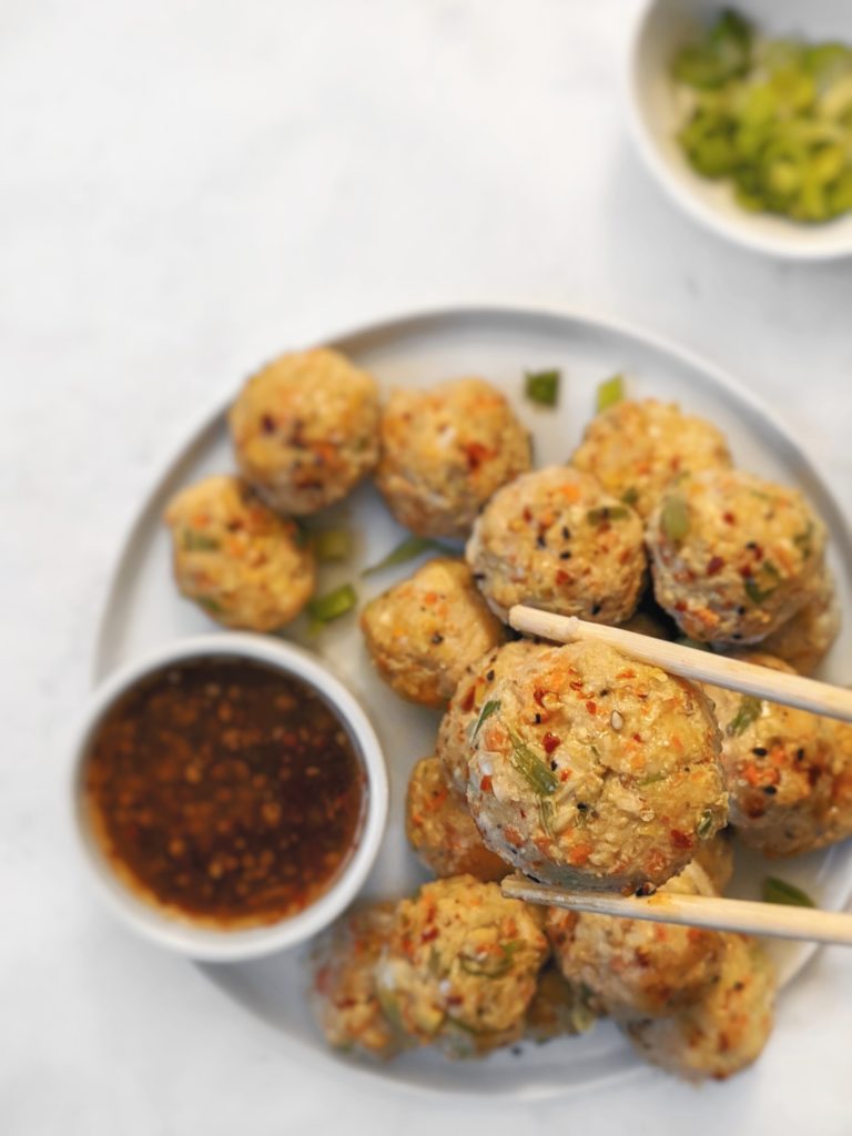 Healthy chicken meatballs combined with cabbage, carrots and coconut aminos for the egg roll flavor while still keeping it healthy and paleo friendly!