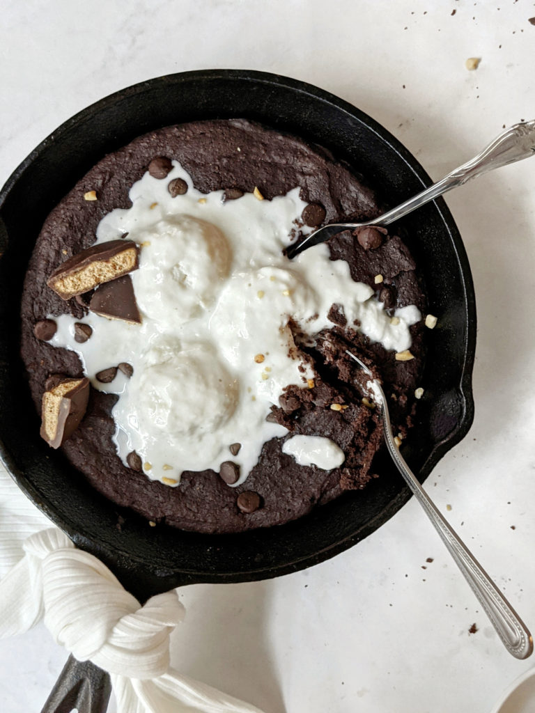 A rich, chocolatey and decadent Double Chocolate Skillet Brownie made with melted chocolate and cocoa powder all in one bowl!
