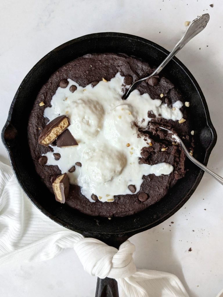 A fudgy and cakey choc chip skillet brownie cake with extra chocolate chips that can be turned into the perfect fudge brownie or brownie bars too.