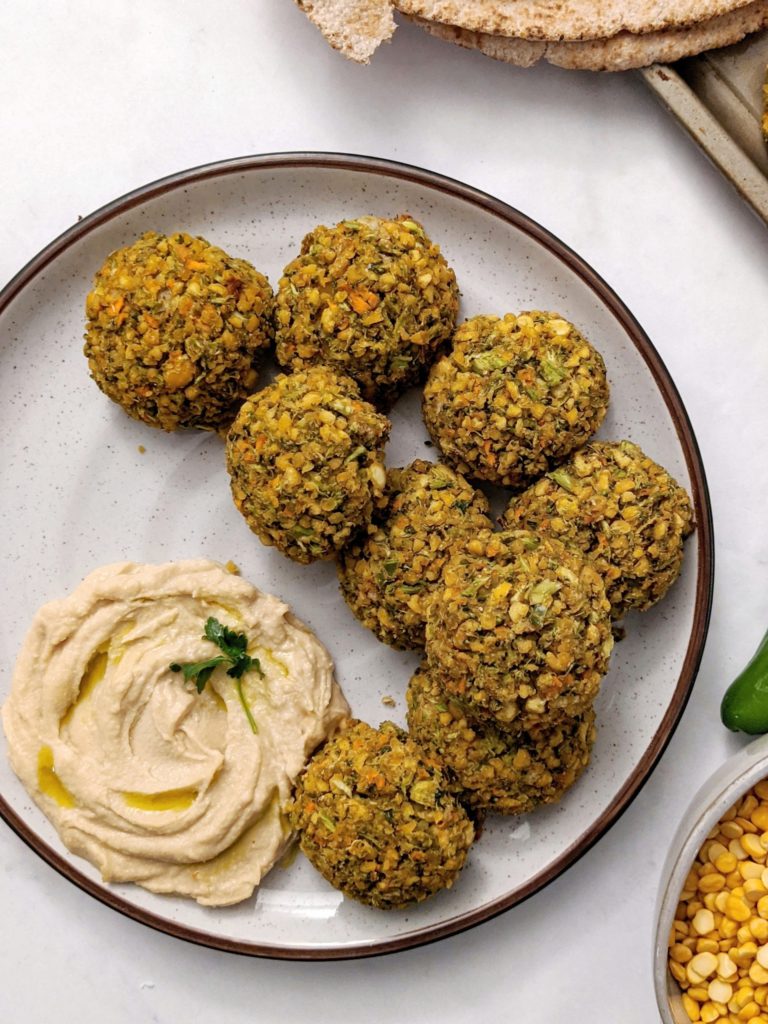 Baked Lentil Falafel - An easy, healthy alternative to the chickpea-based deep-fried balls, that are just as flavorful and crispy. Packed with vegetables for an added boost these patties make a great meal prep lunch too!