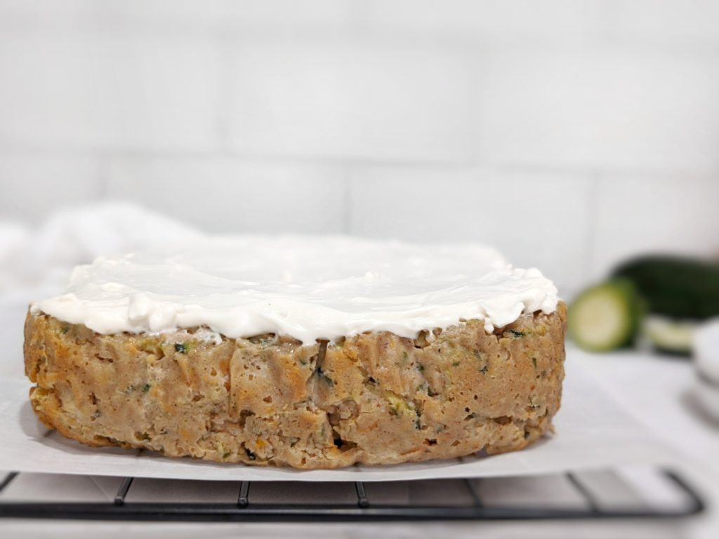 An easy sugar free and dairy free dessert, this spiced zucchini cake is made with stevia sweetener and maple syrup, almond flour and coconut flour, and without milk or butter, making it vegan, paleo and gluten free too!