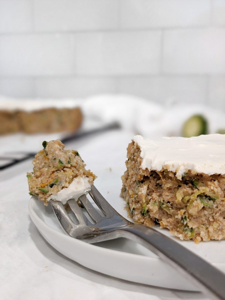 A low sugar, low carb and keto friendly zucchini cake with a healthy cream cheese frosting that you can put away for a great quick and easy dessert