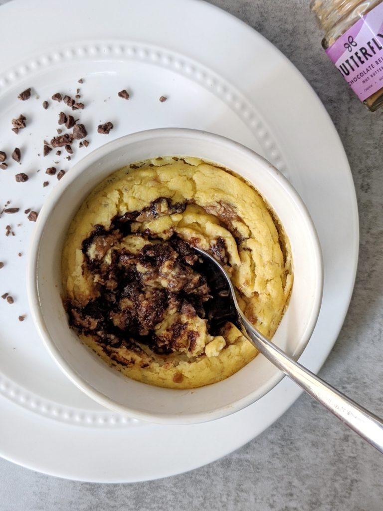 Banana Chocolate Lava Mug Cake: The ooey, gooey center of a molten chocolate cake in a moist banana bread. Made with coconut flour, this makes a perfect single-serve Gluten-free and Paleo-friendly dessert for breakfast!