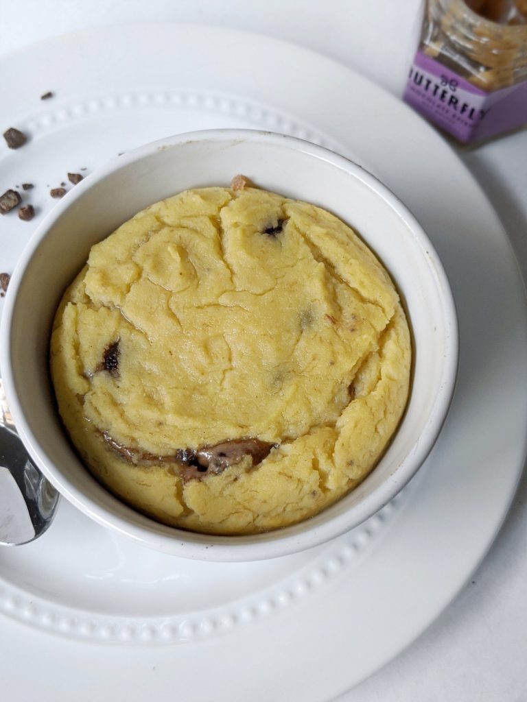 Filled with almond, nut or seed butter and chocolate, this banana mug cake is a cross between a molten chocolate lava cake a microwave banana muffin - a great single serving banana bread.