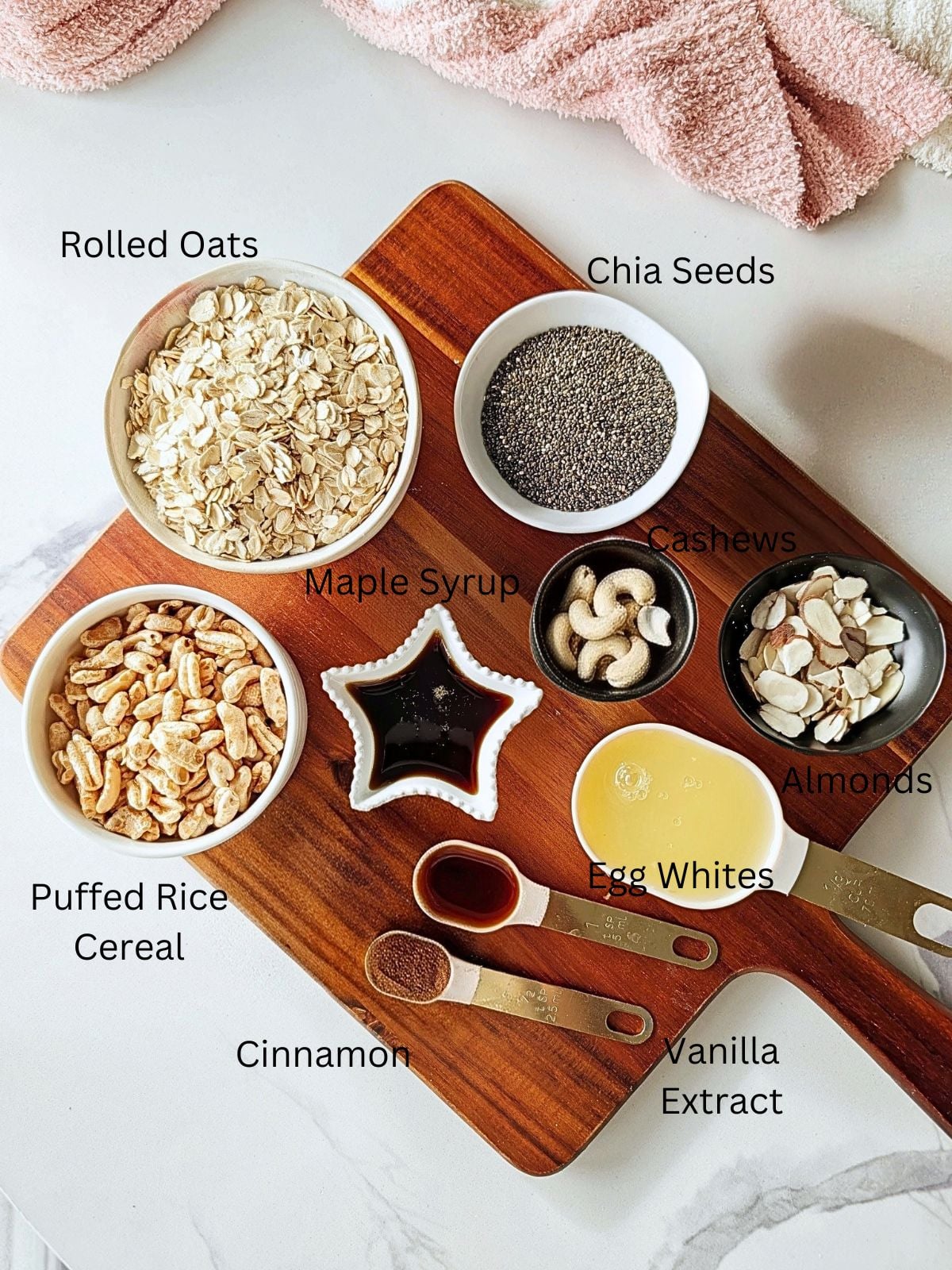 Ingredients for the ultimate no-oil but still crunchy Egg White Granola recipe! A low-fat, low-sugar, and high-volume cereal hack made with egg whites for huge, satisfying clusters.