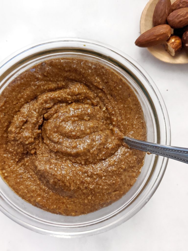 Learn how to make your own creamy or roasted almond butter in a food processor, with no oil.