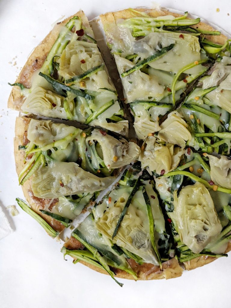 This is a freezer friendly recipe so could meal prep this artichoke and zucchini pizza with dairy free cashew butter pizza sauce and put it away in the freezer - like the typical frozen pizza.