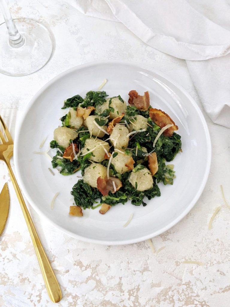 A fancy but simple Creamed Spinach Cauliflower Gnocchi with Crispy Bacon in under 20 minutes! This soft, pillowy Trader Joe’s Cauliflower Gnocchi in a creamy spinach sauce makes an easy and gluten free pasta dinner, perfect for a weeknight!