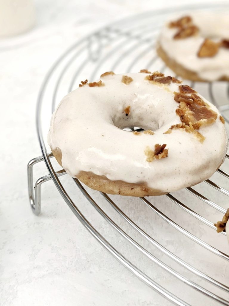 These healthy and skinny maple glazed donuts are made with clean, simple, but high protein ingredients like protein powder and Greek yogurt for an extra protein doughnut recipe!