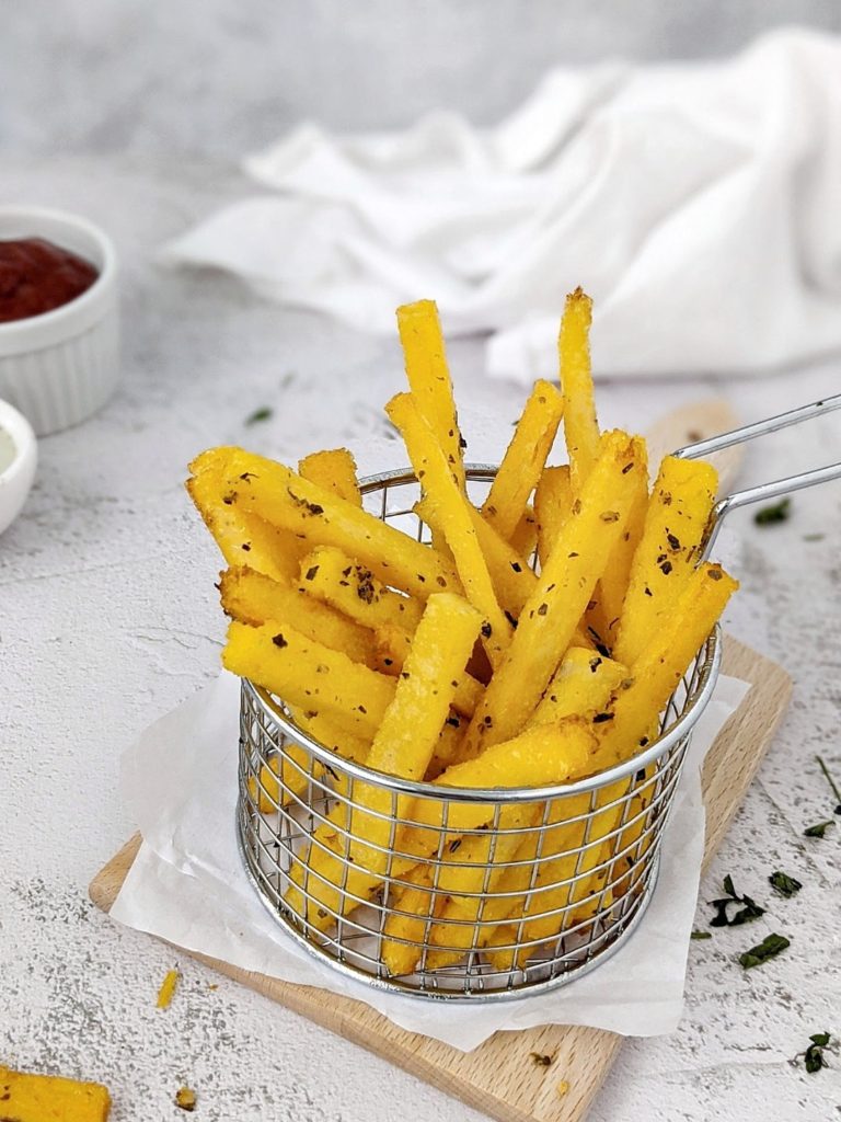 Crispy Garlic & Herb Baked Polenta Fries made with precooked packaged polenta and tossed in a bit of herby garlicky melted butter. An easy, healthy and delicious party appetizer or side dish that’s gluten-free too!