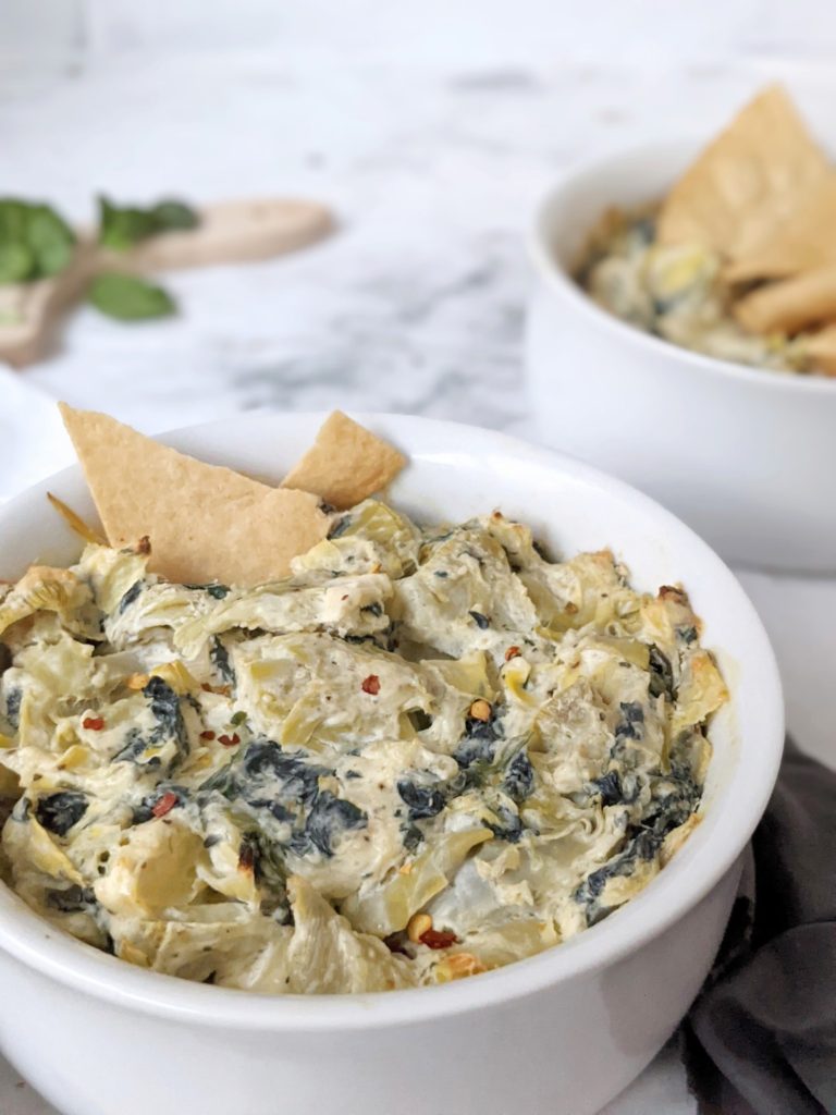 This baked spinach and artichoke dip is heathy because it has no mayo and no sour cream either, but uses Greek yogurt instead, as well as low far cream cheese.