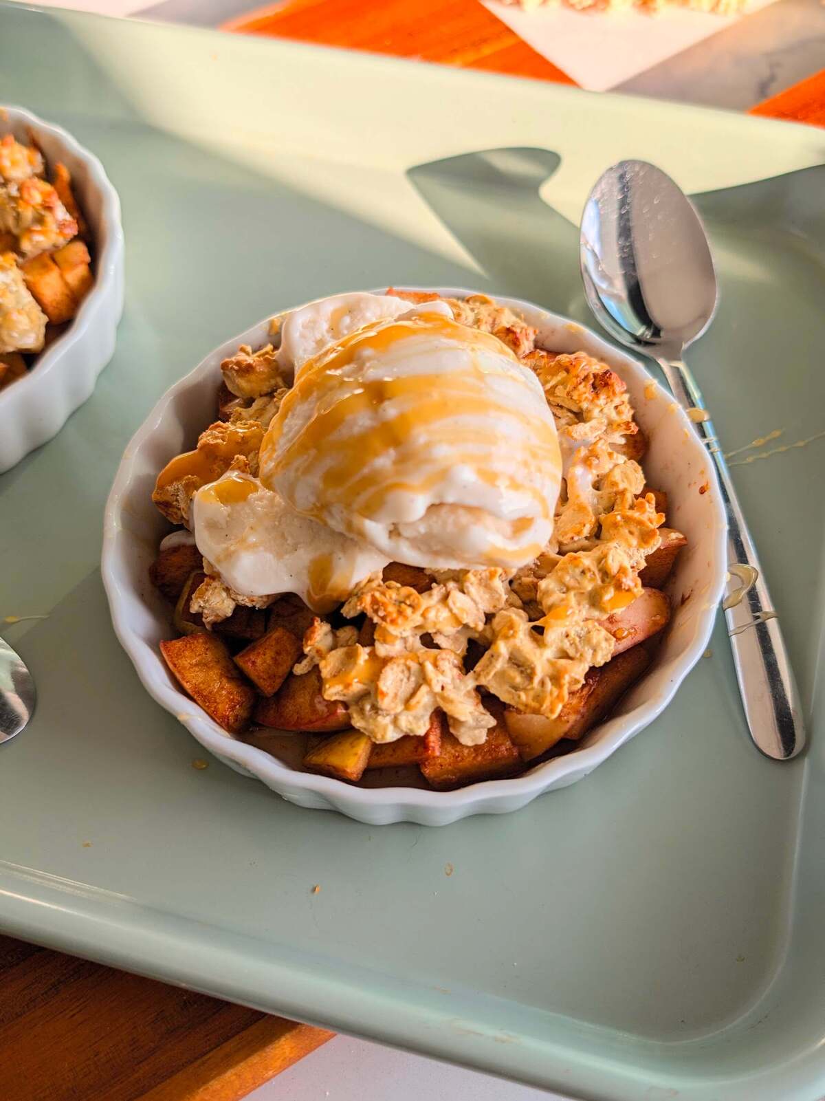 This high protein apple crisp skips the flour, skips the butter, and still gets a genuinely crispy oat topping, thanks to whipped egg whites folded into protein powder and oats. It's 14g protein and 169 calories for a full cup of warm, cinnamon-spiced apples with a topping that actually crisps instead of going doughy. No compromises here.