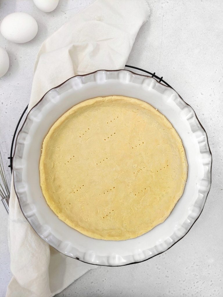 Light and buttery, this Coconut Flour Pie Crust is the perfect base for a keto or low carb pie or quiche recipe. Made with just coconut flour, eggs, butter and salt, it really is easy as pie!