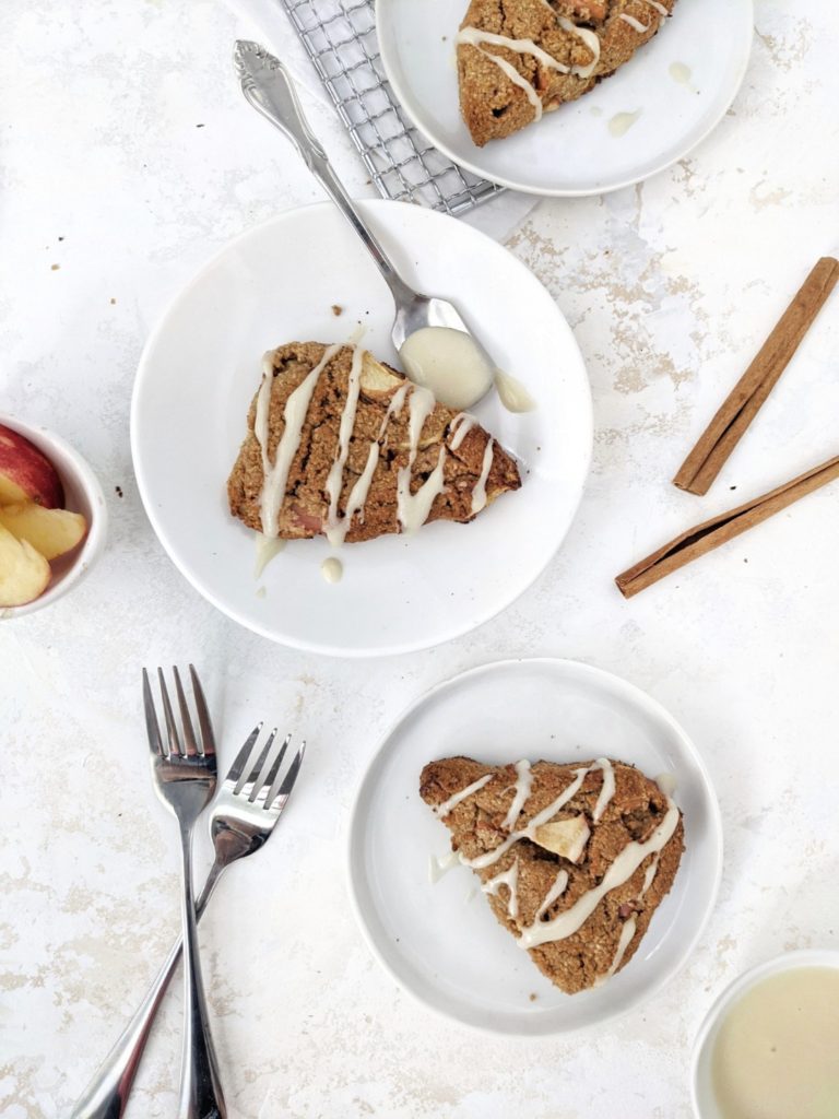 These small batch Apple Cinnamon Scones are sweet, moist, have a perfect crispy edge and drizzled with vanilla protein glaze. Made with Oat flour and Almond flour and full of apple chunks they make a healthy gluten-free treat. Perfect for a fall breakfast, snack or dessert.