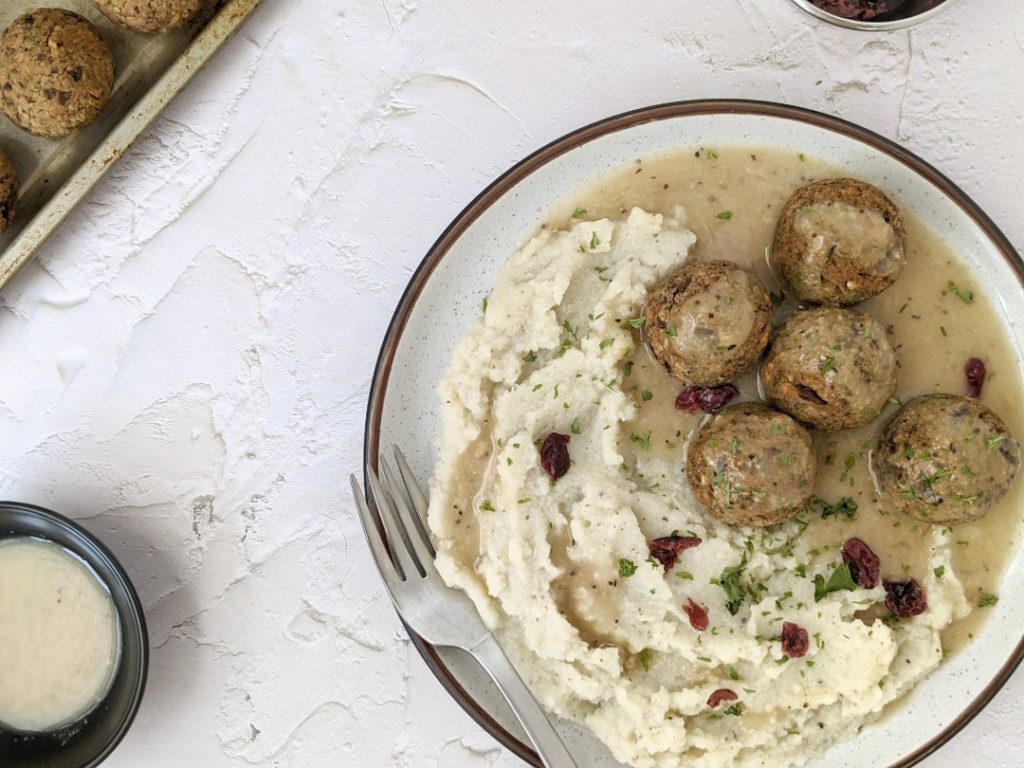 These simple and healthy vegan meatballs are made with lentils, and seasoned with nutmeg, cardamom and parsley for the authentic Swedish meatball flavor.