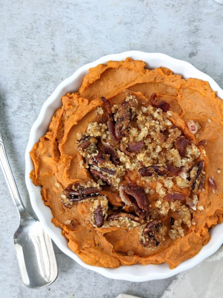 A delicious Sweet Potato Casserole for One topped with a brown sugar Bacon Pecan Streusel. This easy sweet and savory mini sweet potato casserole is made in a ramekin and is great for a single serve or small batch Thanksgiving dessert.