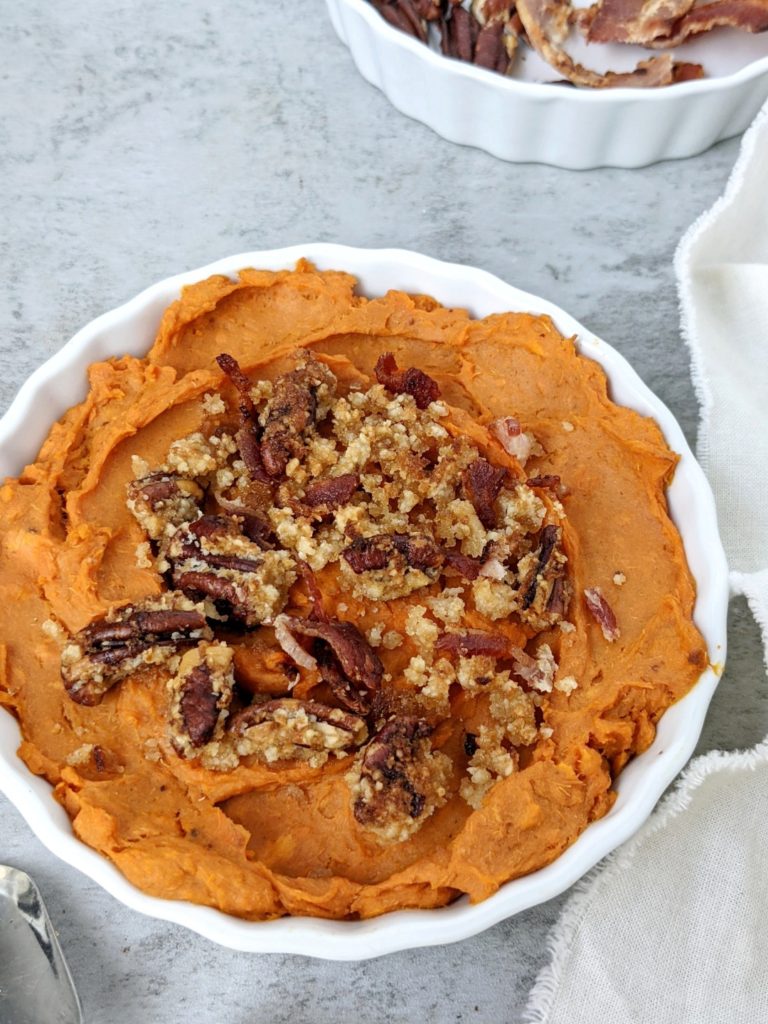 A delicious Sweet Potato Casserole for One topped with a brown sugar Bacon Pecan Streusel. This easy sweet and savory mini sweet potato casserole is made in a ramekin and is great for a single serve or small batch Thanksgiving dessert.