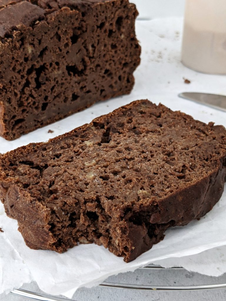 With just 100 calories a slice, this healthy Chocolate Protein Banana Bread is as good as it gets! A fat free and sugar free chocolate banana bread made with whole wheat flour and sweetened with chocolate protein powder. No oil and no sugar added!