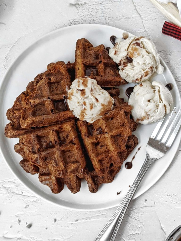 Light, fluffy and simple Whole Wheat Pumpkin Chocolate Waffles made with Cacao Powder and sweetened with Stevia! These healthy pumpkin waffles with all the chocolate and pumpkin spice are freezer friendly and perfect for breakfast or dessert!
