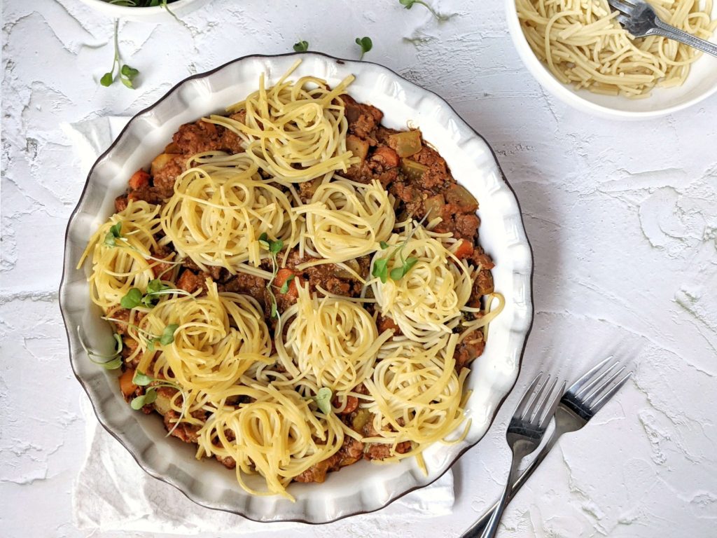 This Healthy BBQ Spaghetti Bolognese Bake has a veggie loaded ground beef filling flavored with barbecue sauce! A customizable bbq baked spaghetti bolognese with vegetables, leftover meat sauce or even spaghetti, it truly is an amazing pasta bake.