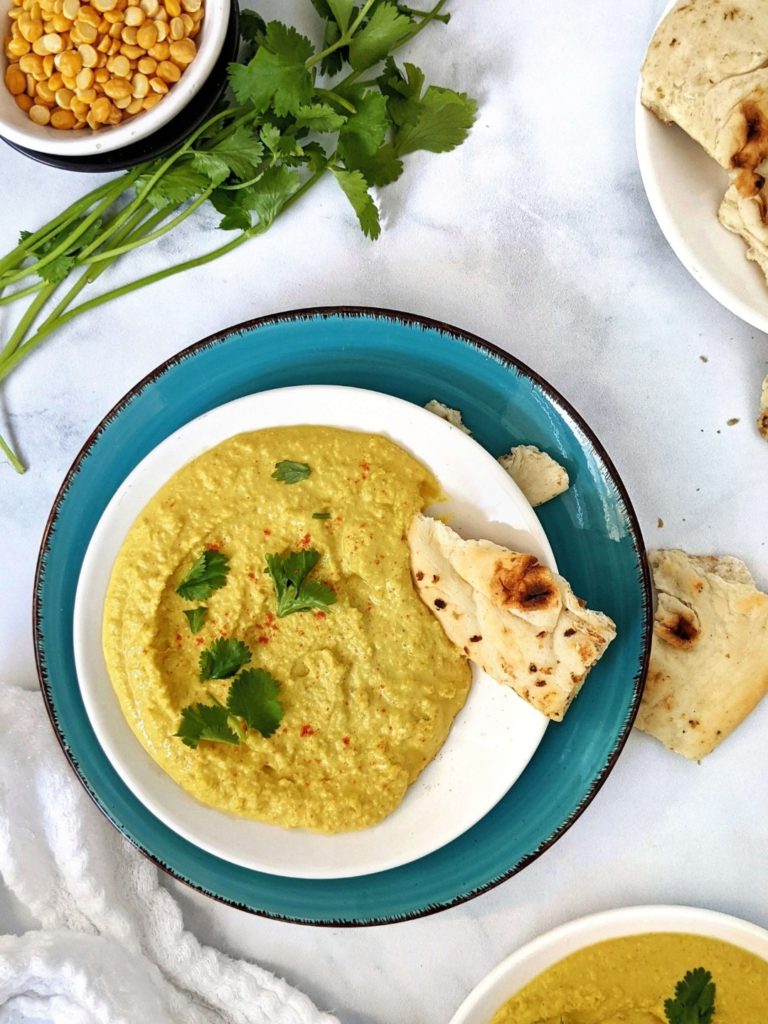 Loaded with spices, this Healthy Curry Lentil Hummus is rich in flavor, fiber and protein. An easy and oil free Vegan lentil hummus that’s a great dip for some warm naan too!