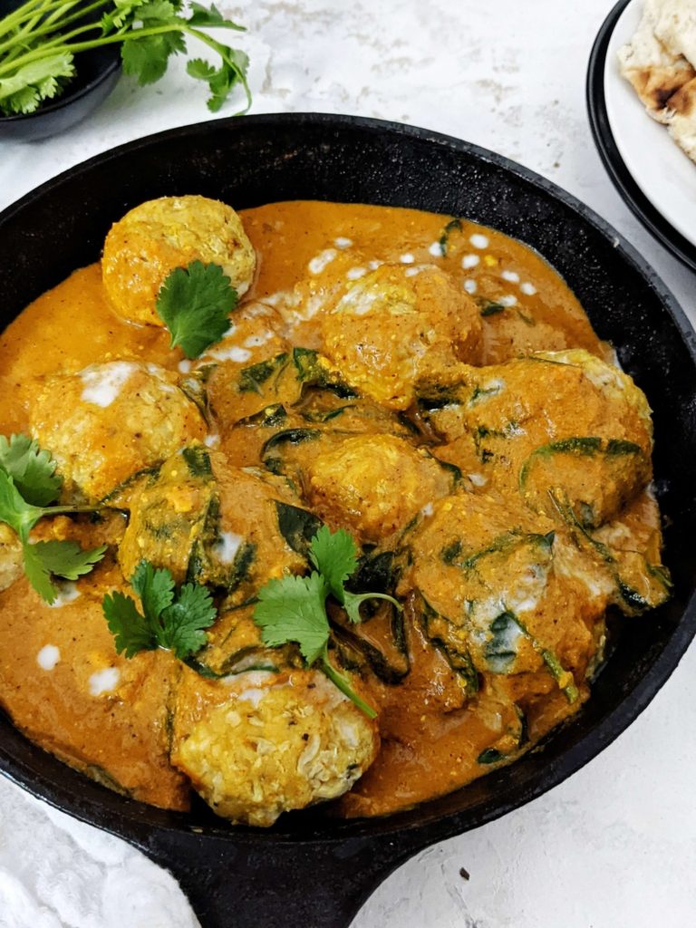 Perfectly flavorful yet Healthy Indian Chicken Meatballs Curry! This Chicken Kofta Curry has baked gluten free chicken meatballs in an aromatic coconut milk curry sauce. A great Paleo friendly dinner recipe!