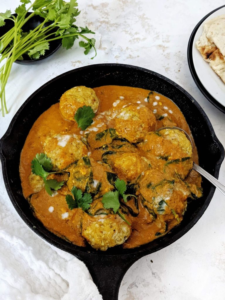 Perfectly flavorful yet Healthy Indian Chicken Meatballs Curry! This Chicken Kofta Curry has baked gluten free chicken meatballs in an aromatic coconut milk curry sauce. A great Paleo friendly dinner recipe!