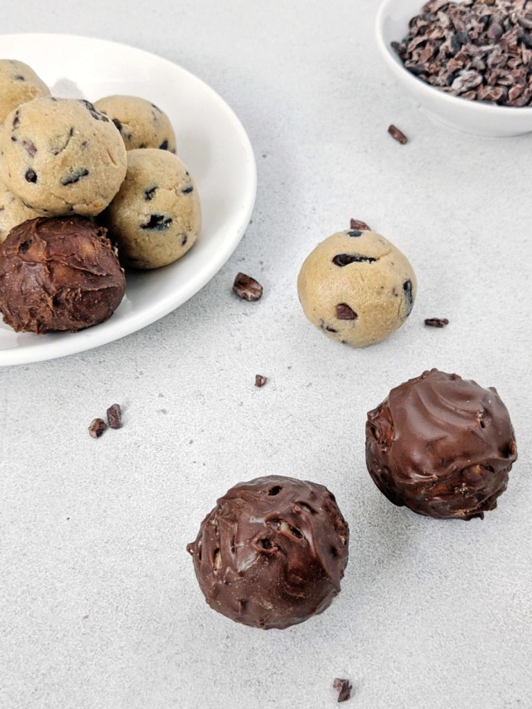 Easy and healthy Low Carb Cookie Dough Protein Balls made with cashew butter, vanilla protein powder, and studded with cacao nibs! No bake cookie dough protein bites are perfect for a Keto, Vegan and Gluten free snack, high protein dessert or energy boost.