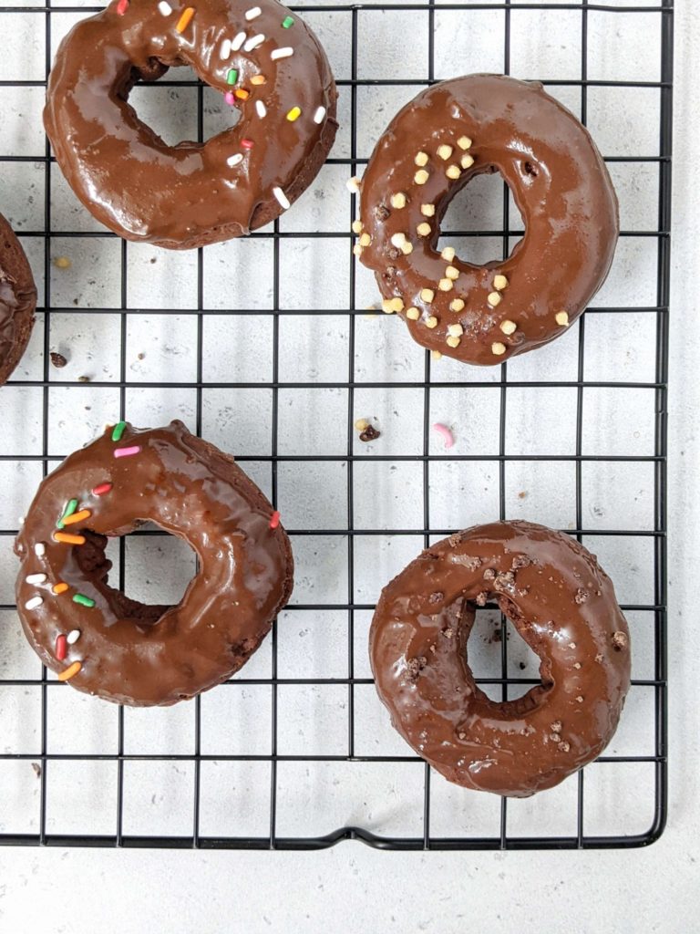 Super easy and healthy Air Fryer Chocolate Donuts made from scratch with no yeast! Soft, fluffy and chocolate glazed, these air fryer cake donuts are perfect for breakfast or dessert. Sugar free, gluten free and Vegan too! 