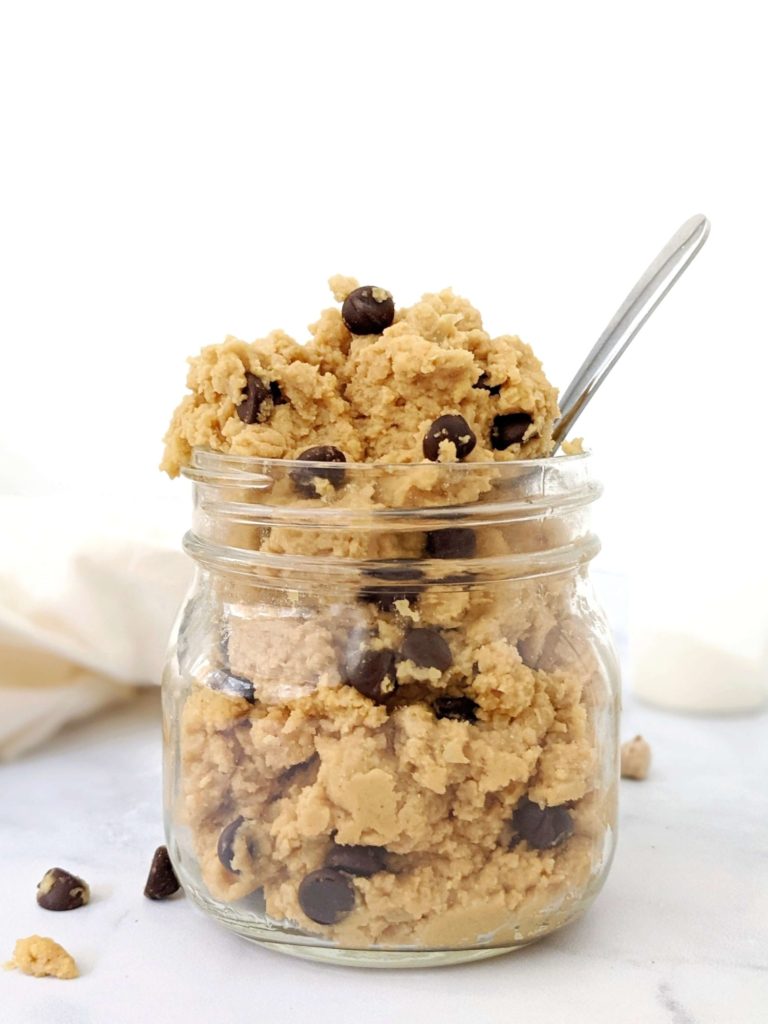 An edible low calorie Protein Chickpea Cookie Dough made with protein powder, peanut butter powder and sugar free chocolate chips. This healthy cookie dough recipe is Vegan and Gluten free too - the perfect protein powder and chickpea dessert.