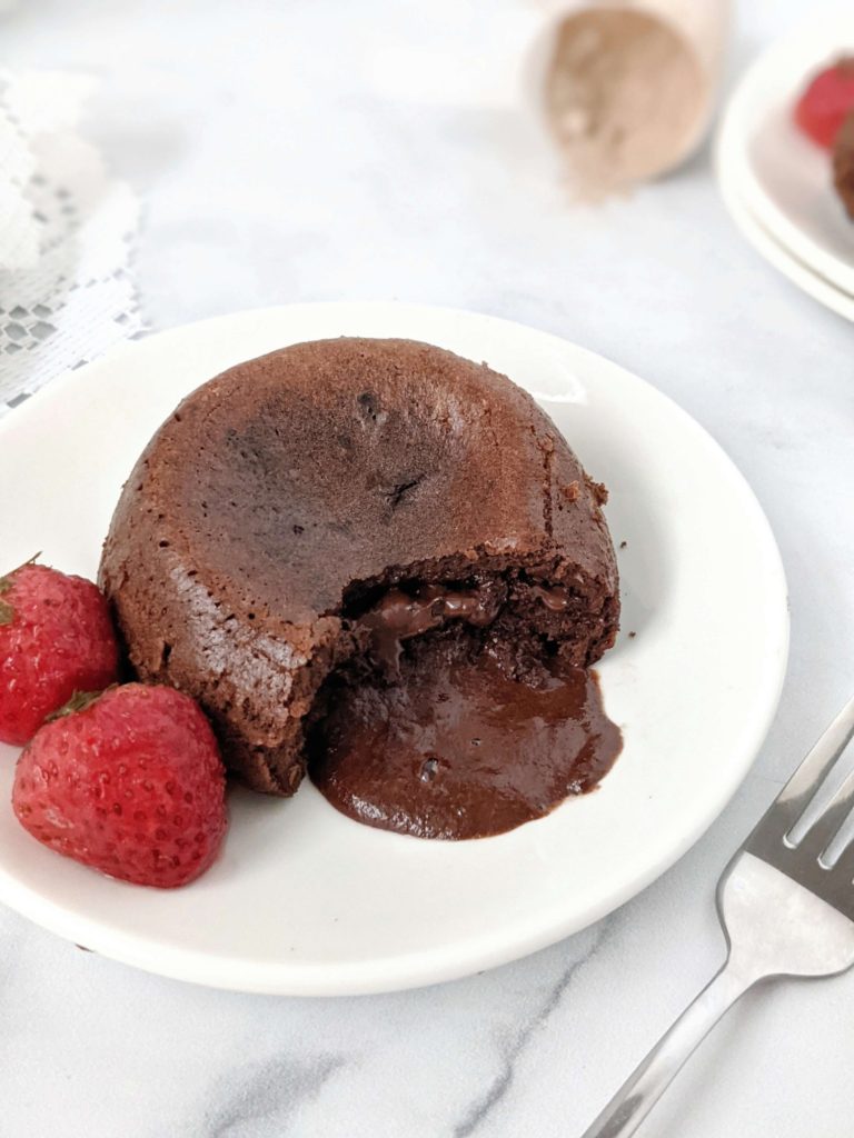 An easy and healthy Protein Chocolate Lava Cake for One made with protein powder and cocoa powder. This protein lava cake is sugar free and has the molten chocolate center with no butter needed - a perfect indulgent dessert!