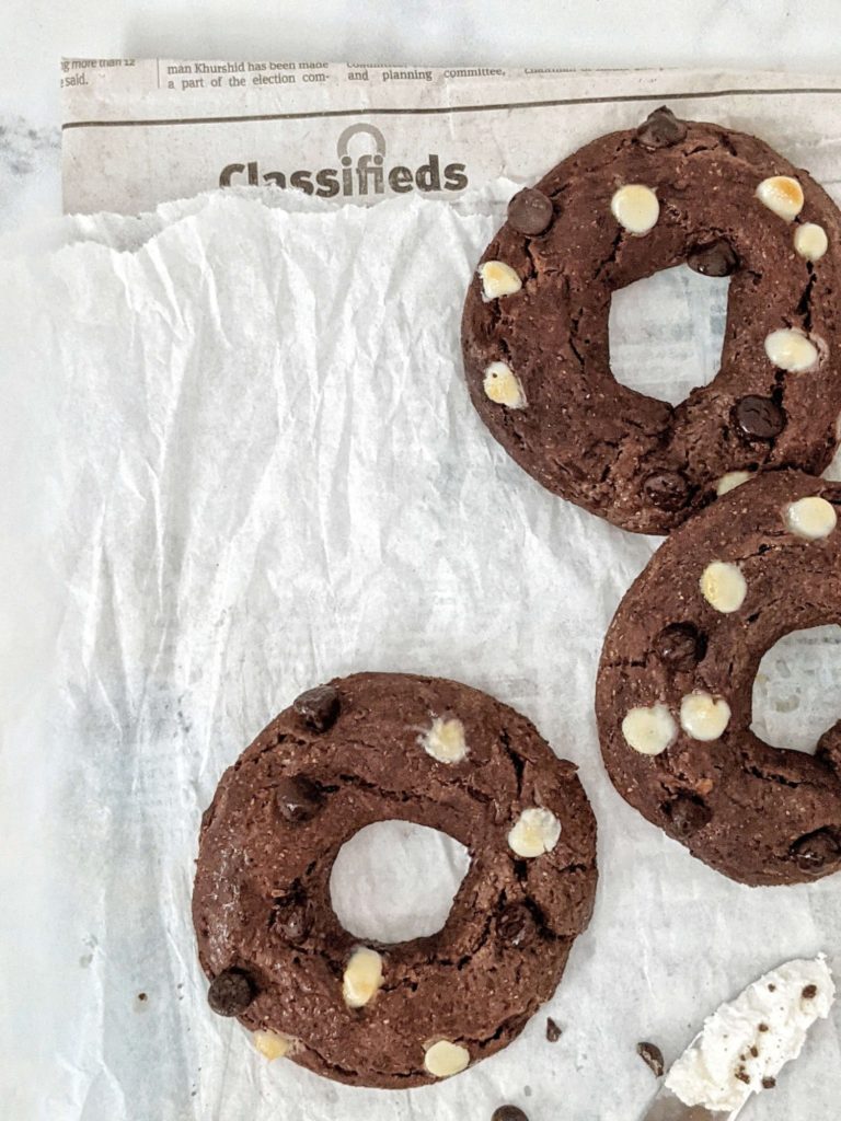 Healthy Whole Wheat Chocolate Bagels made with no yeast! Using whole wheat flour and greek yogurt, these 2 ingredient dough chocolate chocolate chip bagels are baked and perfect quick dessert-breakfast!