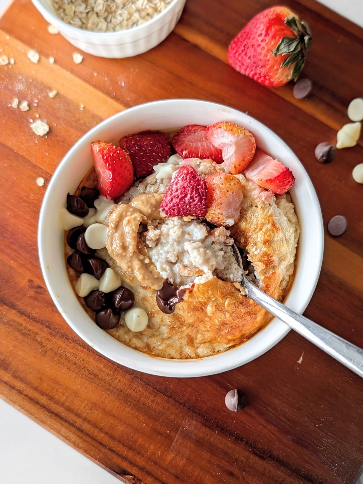 Try these quick 10-minute air fryer baked oats! A healthy, single-serve air fryer protein oatmeal recipe made with yogurt, no egg, and no banana.
