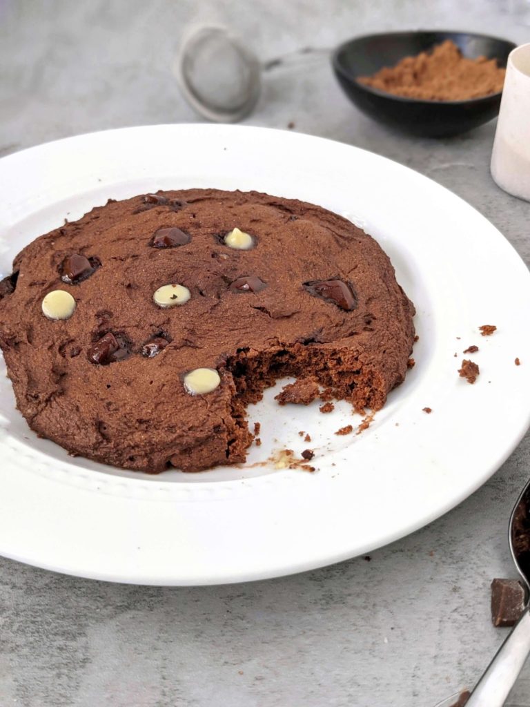 A very Big 6” Double Chocolate Protein Cookie made in the Microwave in under 2 minutes! This single serve protein cookie has no egg, no sugar and no oil; Perfect for a post workout or healthy dessert.